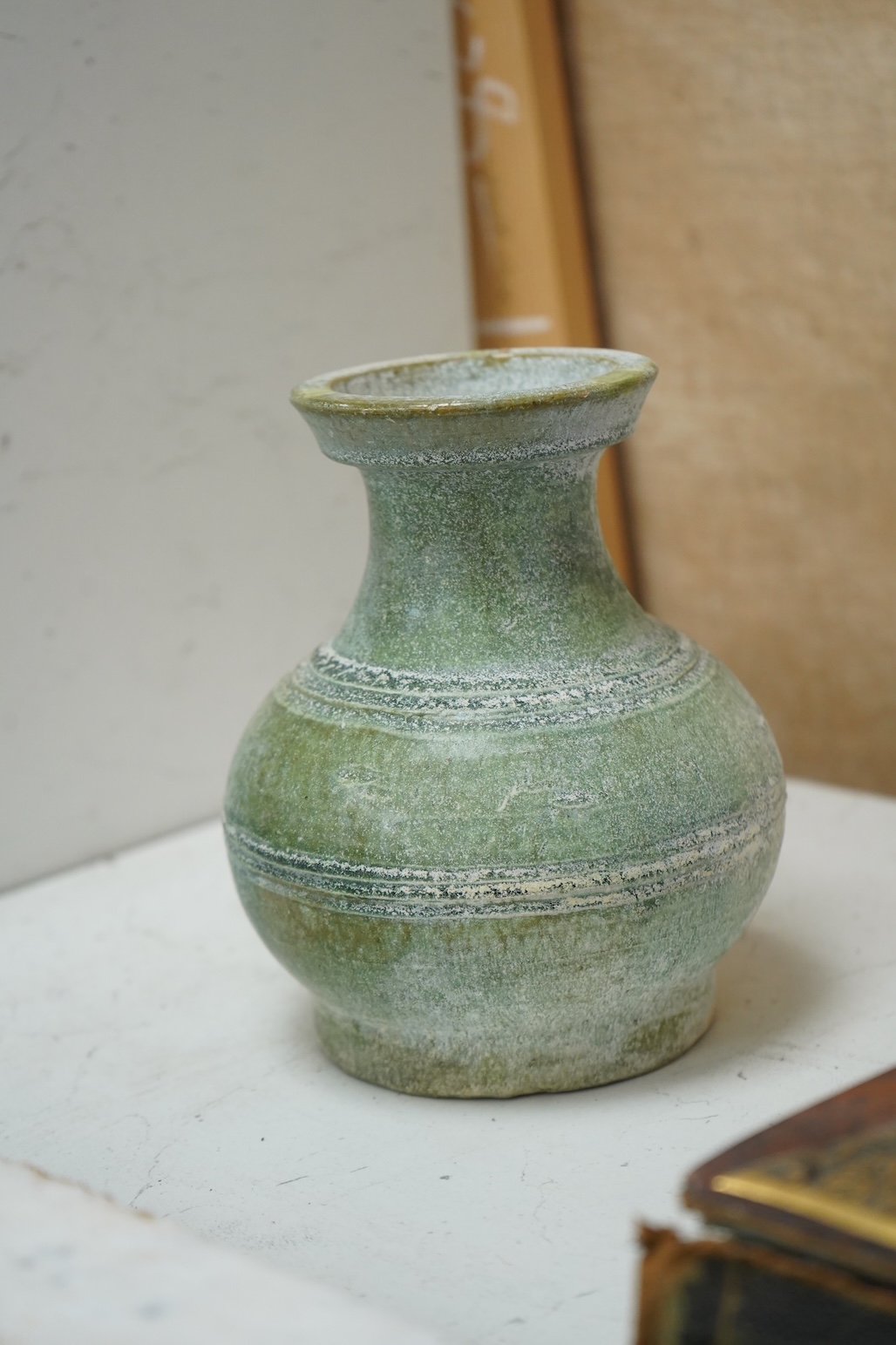 A Chinese silvery green glazed hu, Han dynsasty, 17cm high